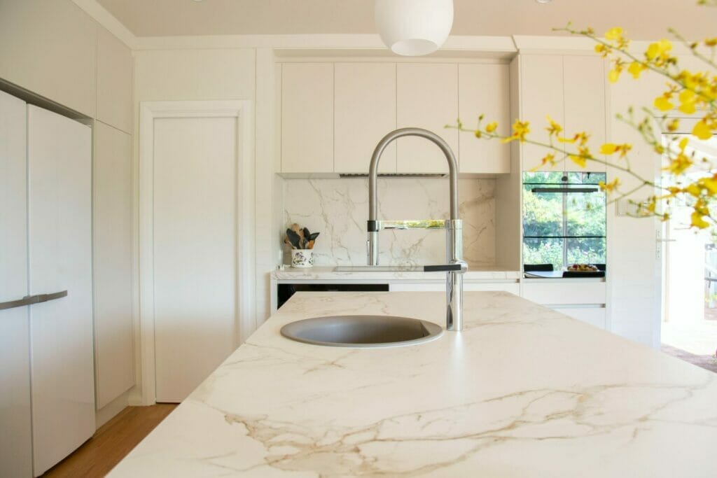 Natural stone tiles are a popular choice for kitchen floor tiles. 